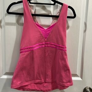 Woman’s pink Lululemon tank top
